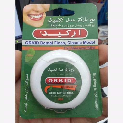 نخ دندان ارکید مدل نازک حاوی موم عسل و نعنا