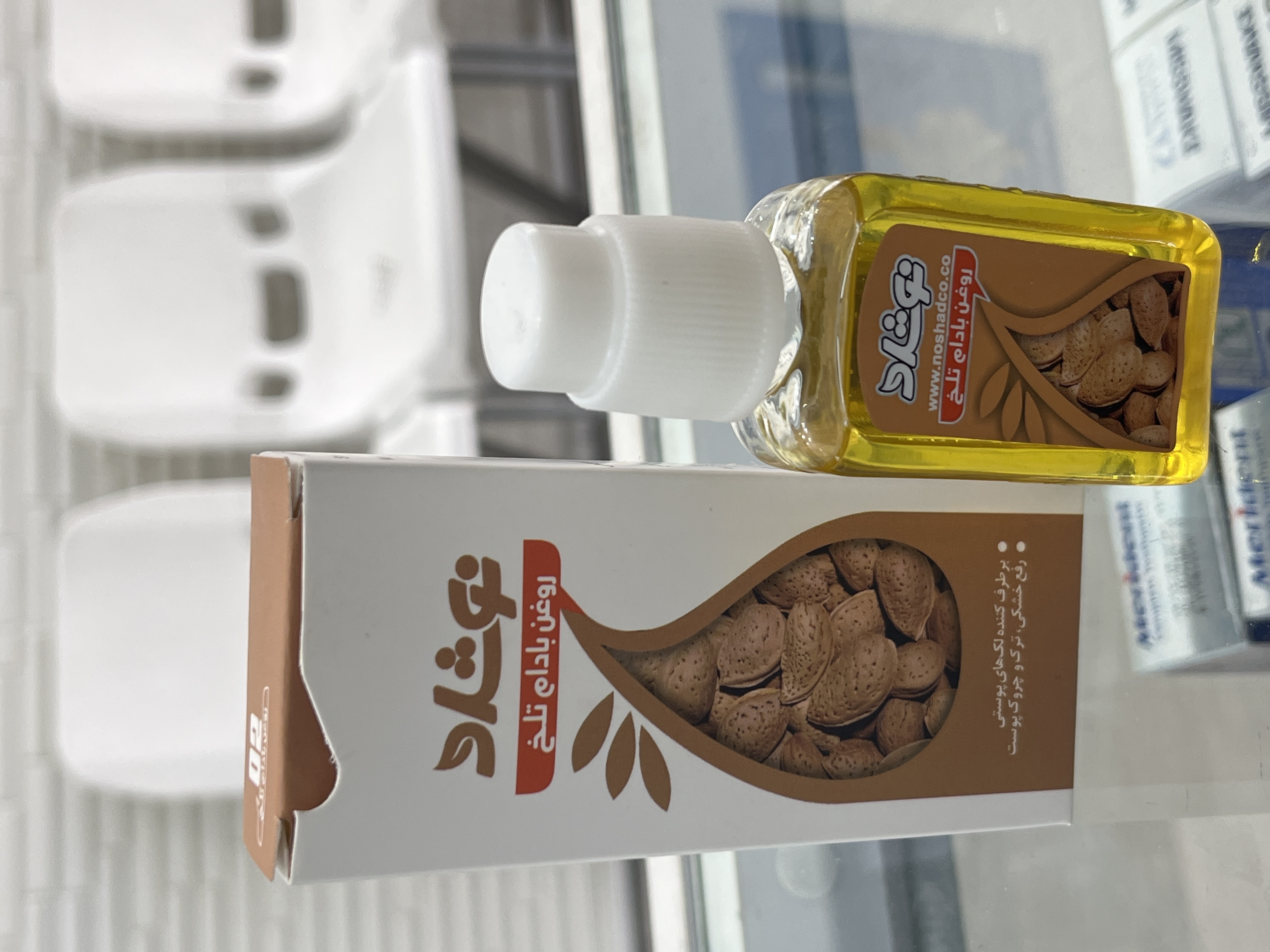 روغن بادام تلخ نوشاد برای لک، خشکی و ترک پوست 37 میلی لیتر